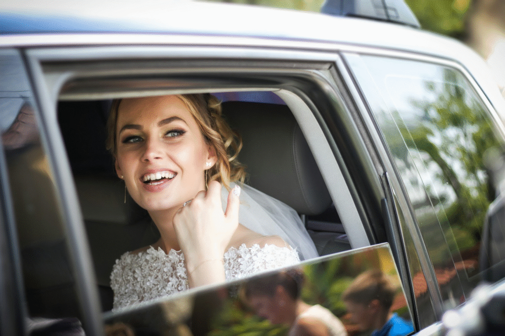 A bride looks happy on her wedding day.